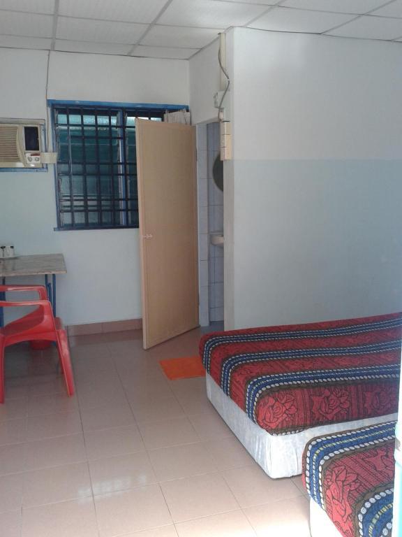 Et Budget Guest House Batu Feringgi Oda fotoğraf